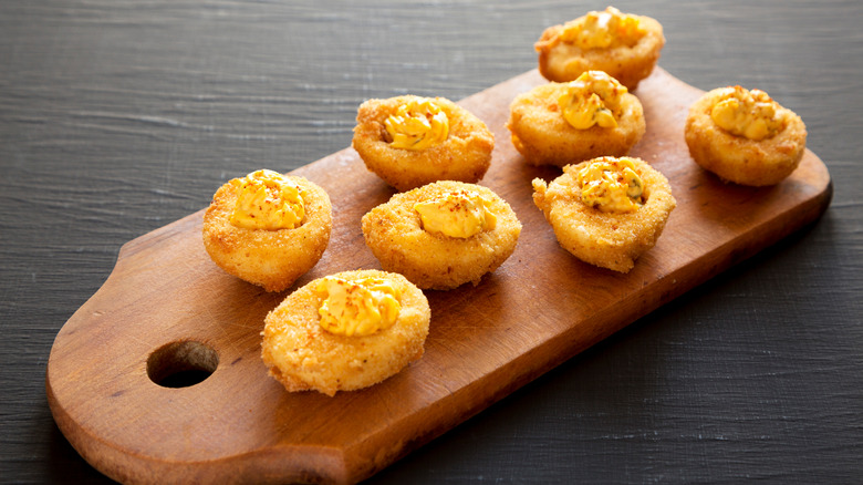 https://www.thedailymeal.com/img/gallery/deep-fry-your-deviled-eggs-for-a-perfectly-crunchy-appetizer/intro-1690331985.jpg