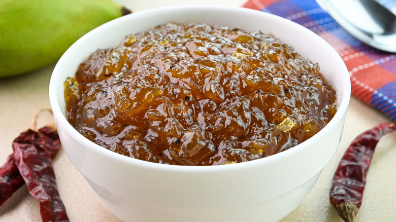 Mango chutney in a white bowl