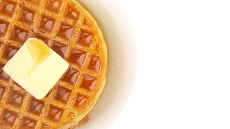 Toaster waffle with butter and syrup