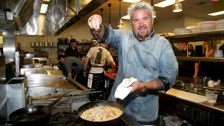 Guy Fieri preparing a dish