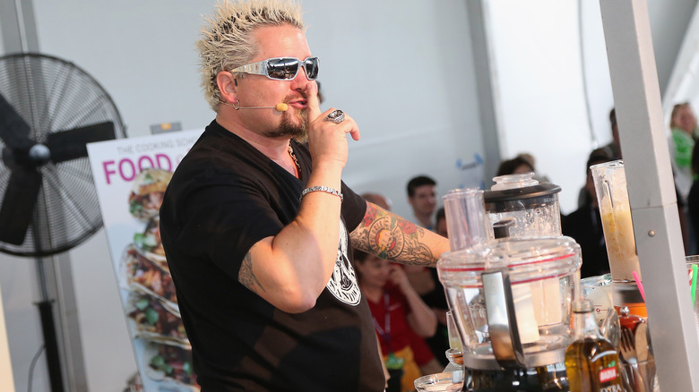 Guy Fieri shushing