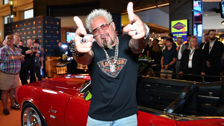 Guy Fieri pointing at the camera