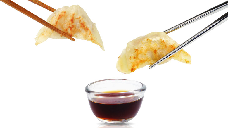 Prawn dumplings with red dipping sauce