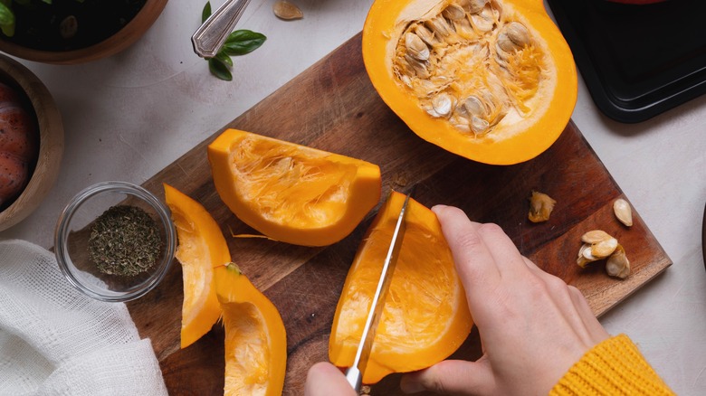 cutting squash with a knife