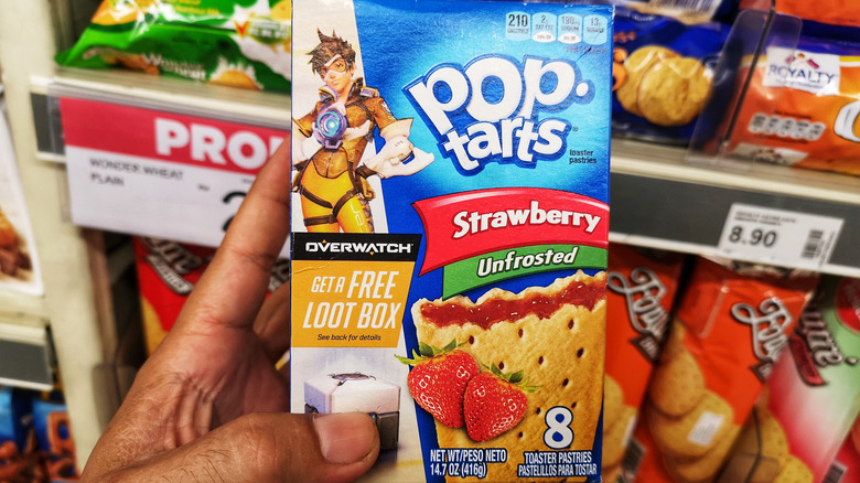 hand holds box of unfrosted strawberry pop tarts