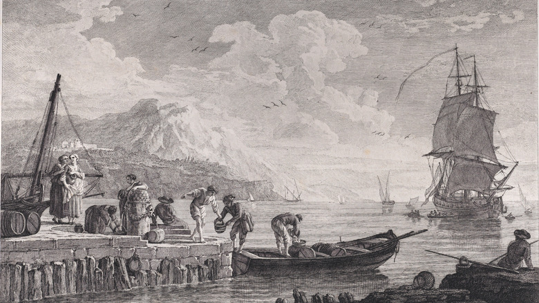 An old wooden ship is unloaded