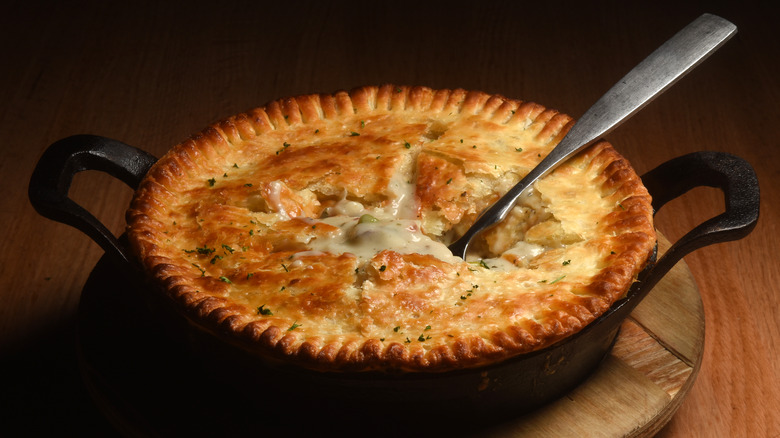 chicken pot pie pierced with a spoon