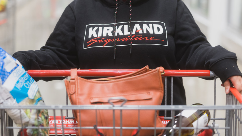 Shopper with Kirkland sweatshirt 