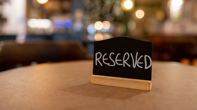 A reserved sign on a table