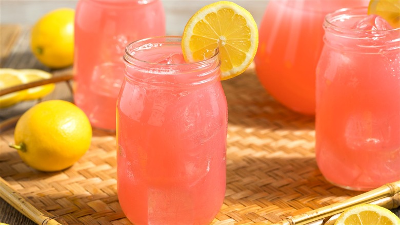 Pink lemonade in glass jars 