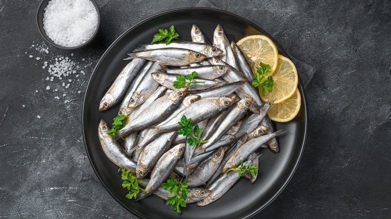 fresh sardines on plate 