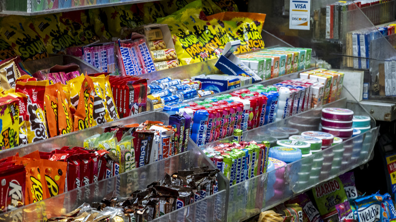 Colorful candy display filled with many types of sweets