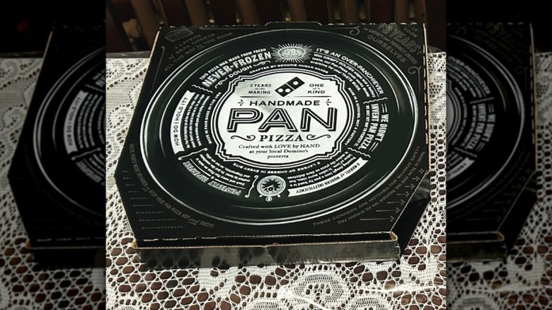 Close up image of Domino's stuffed crust pizza box