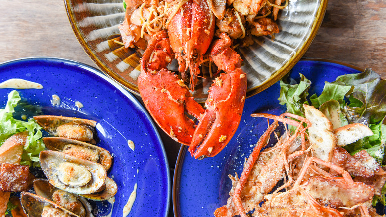 Plates of seafood and lobster