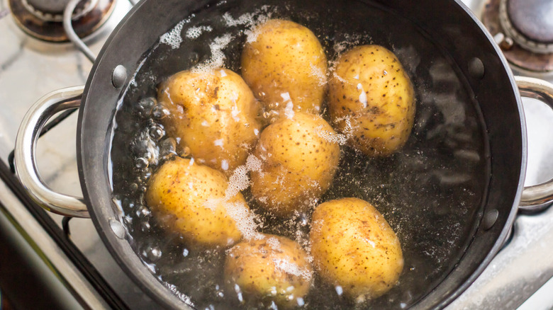 Potatoes boiling in a pot