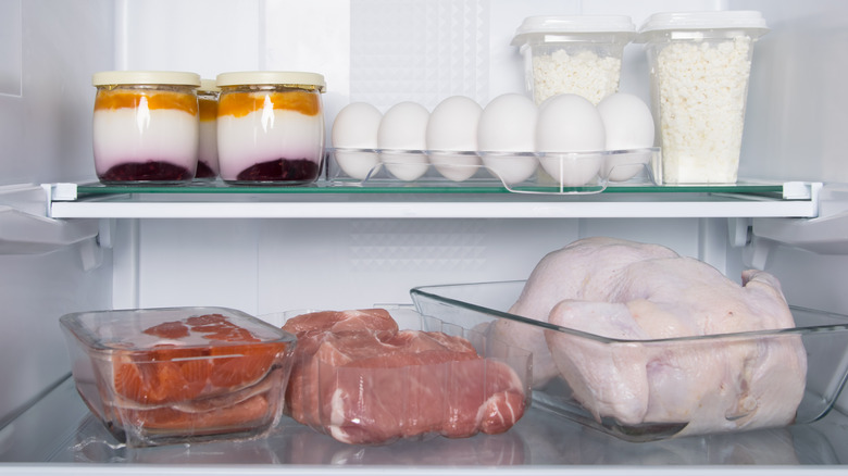 Uncovered chicken in refrigerator