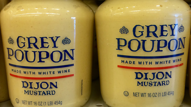 Jars of Dijon mustard