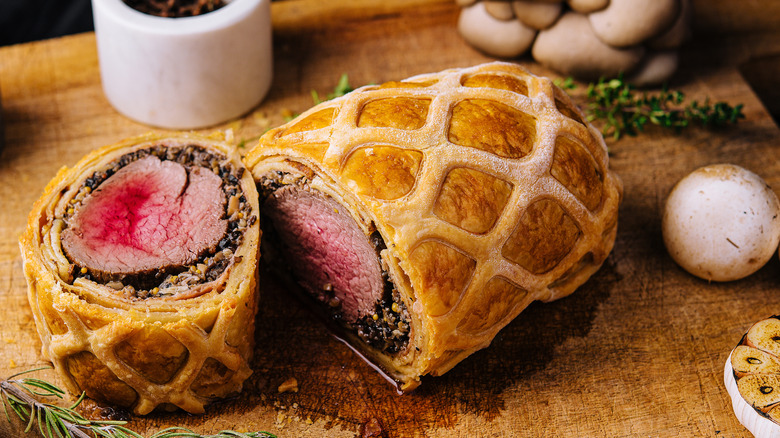 Beef Wellington on cutting board