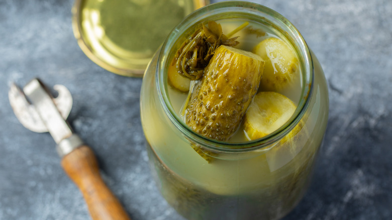 Open jar of pickles