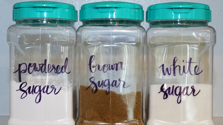 Containers of different types of sugar