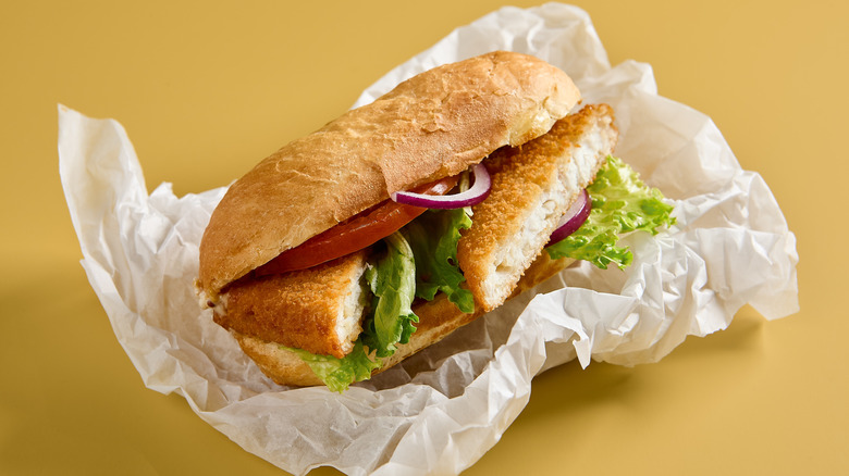 Crispy fish sandwich in parchment paper