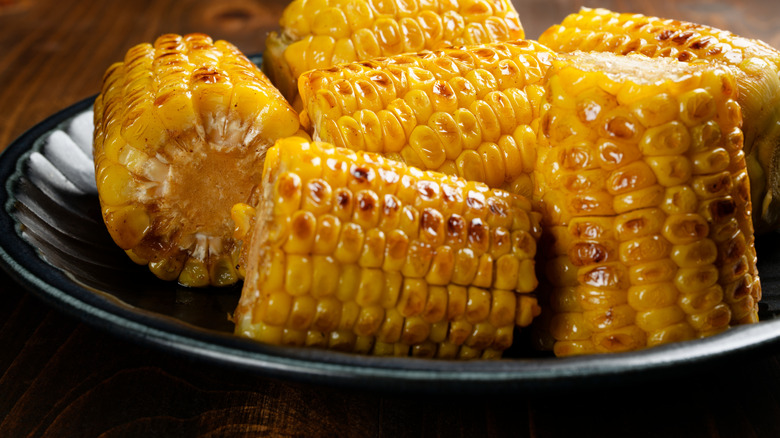 Grilled corn, seasoned with butter
