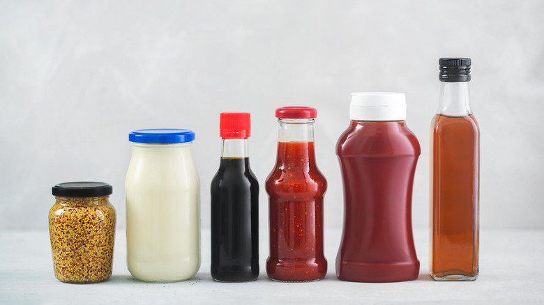 Line-up of bottled condiments