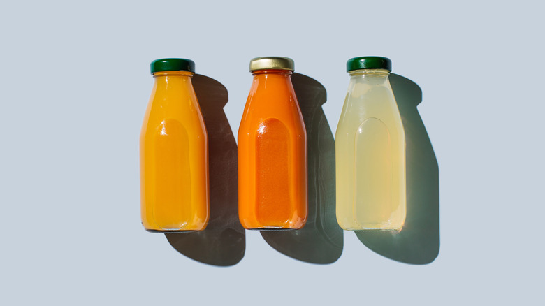 Colorful drinks in glass bottles