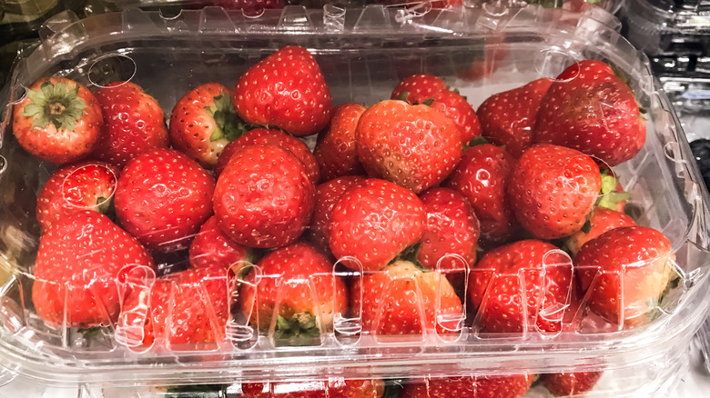 Strawberries in a plastic container