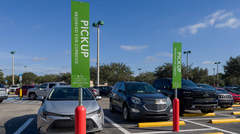 Parking lot with designated Publix Pickup Curbside parking