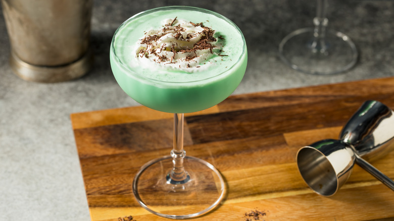 A Grasshopper cocktail topped with shaved chocolate