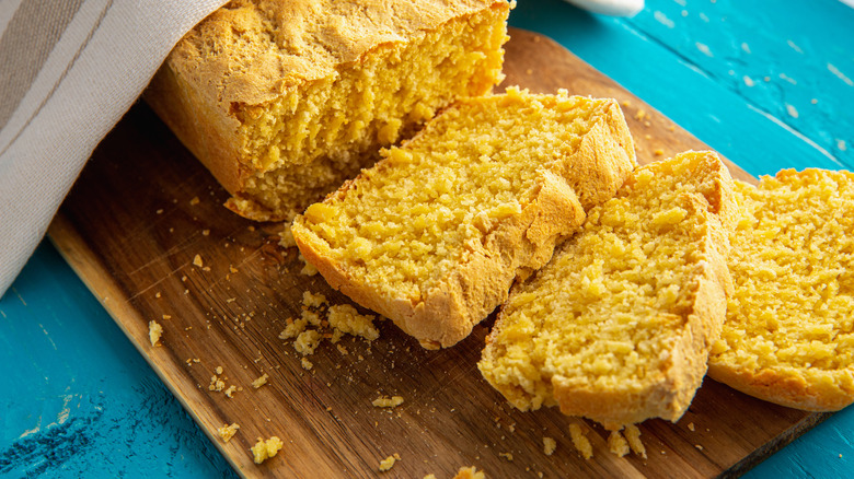 loaf of cornbread cut into slices