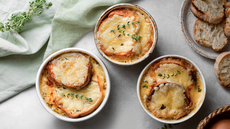 Crocks of French onion soup