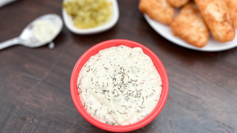 tartar sauce on side of fried fish