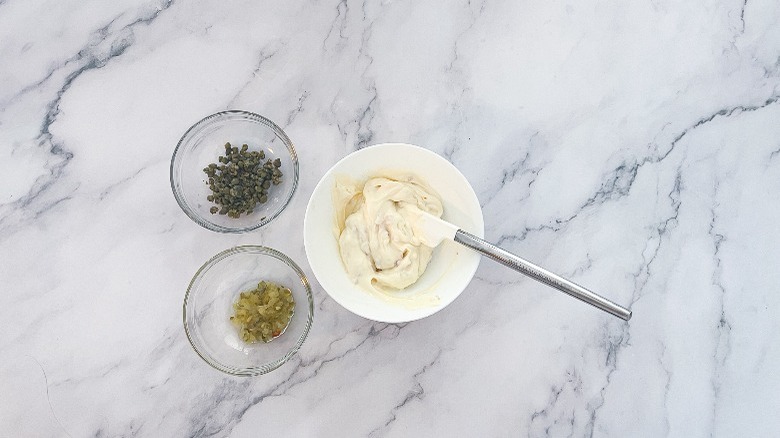 small bowls of mayonnaise and capers