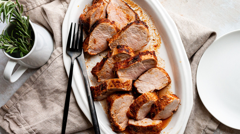 pork tenderloin slices on platter