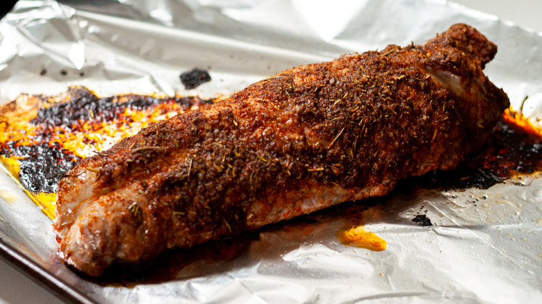 pork tenderloin on baking sheet