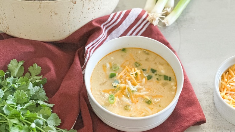 white chili topped with cheese