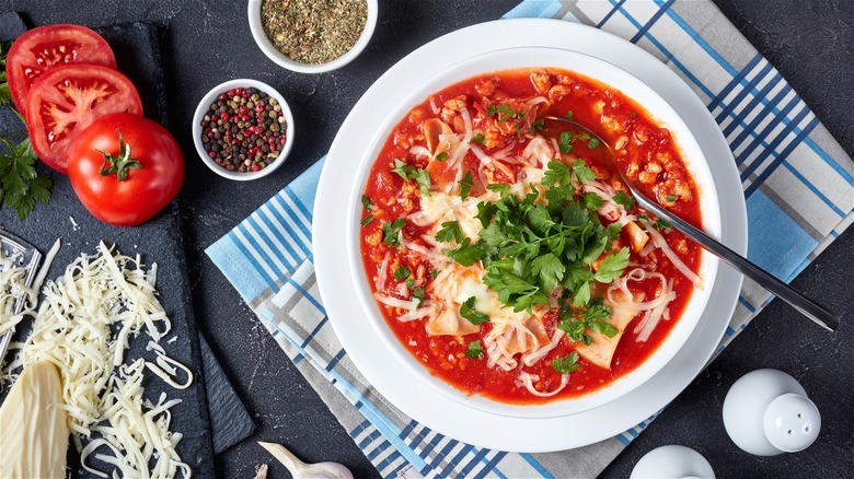 Lasagna soup with cheese and herbs 
