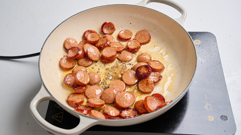 browning sausage in a skillet