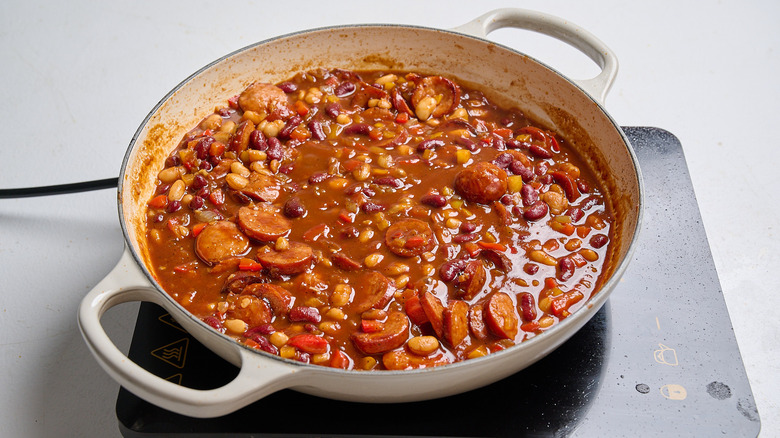 simmering ingredients together in a skillet