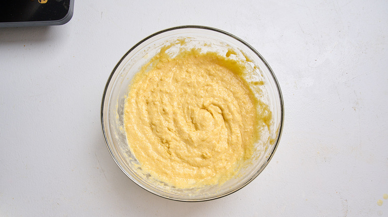 cornbread batter combined in a bowl