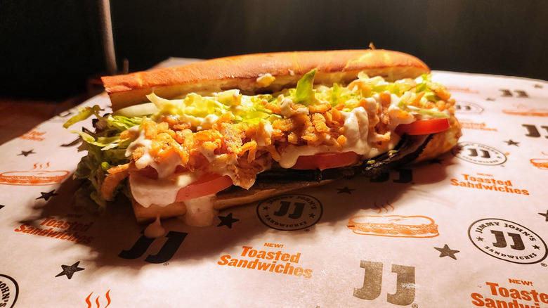 Jimmy John's Roast Beef & Cheddar sandwich on company wrapping