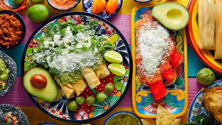 Enchiladas, tamales, and condiments