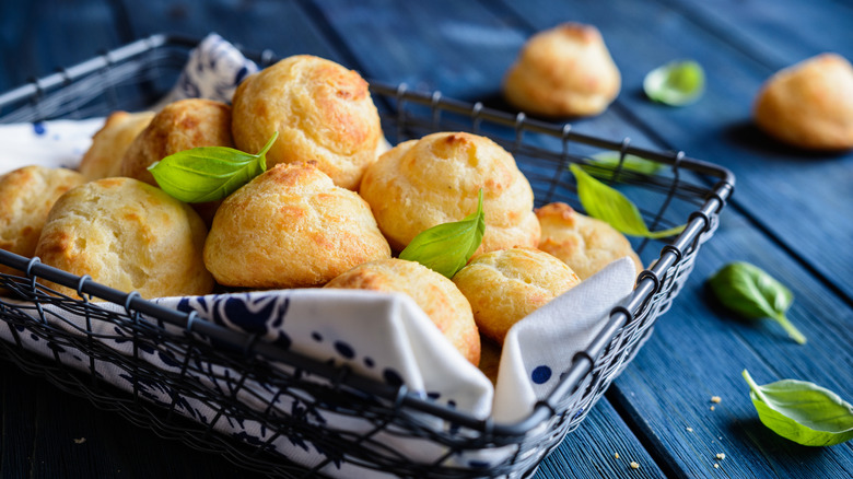 Pile of gougeres in basket