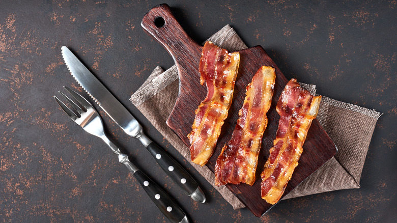 bacon on cutting board