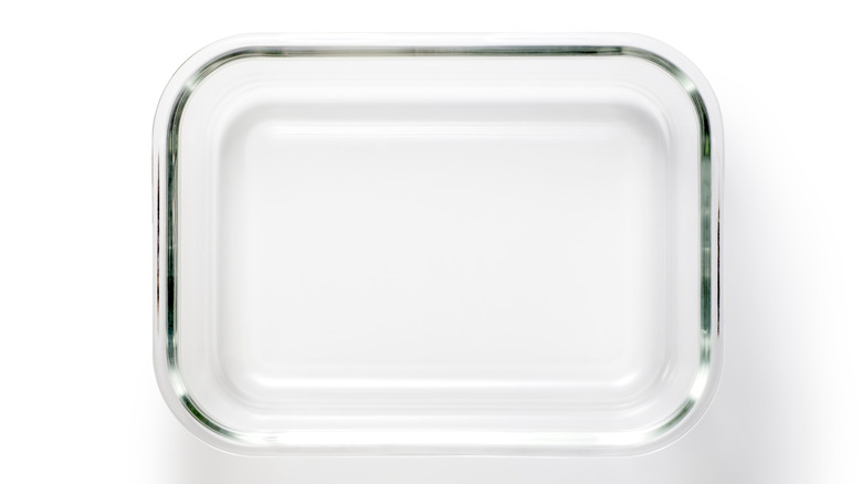 A glass dish placed on a white table