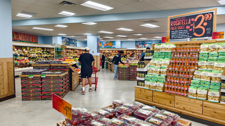Shoppers browsing the aisles of Trader Joe's store