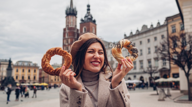 Polish girl holding bagels