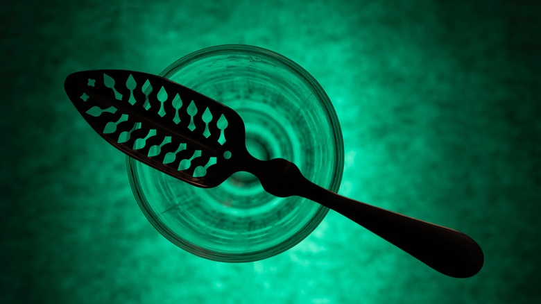 Slotted spoon on glass